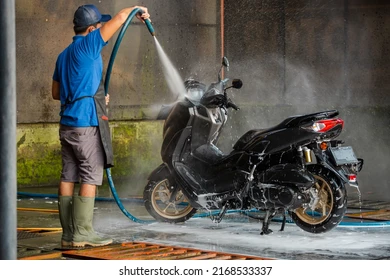 professional-worker-using-hose-detailed-260nw-2168533337